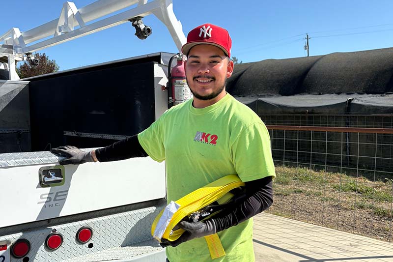 person standing near the back of a truck